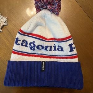 Patagonia Power Town Red, Blue, and White Pom Beanie